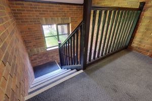 Communal Stairwell to First Floor- click for photo gallery